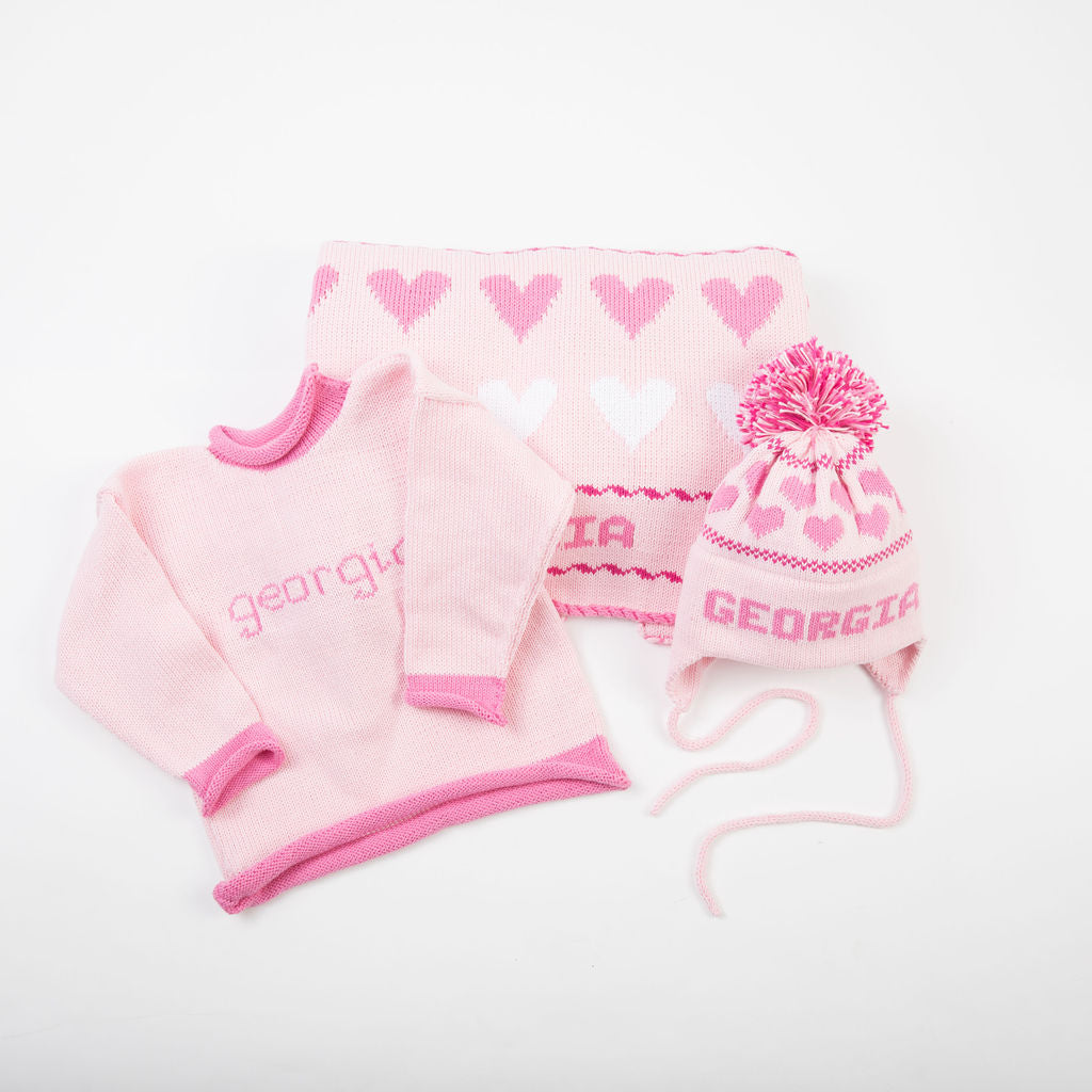 personalized baby blanket, hat, and clothing